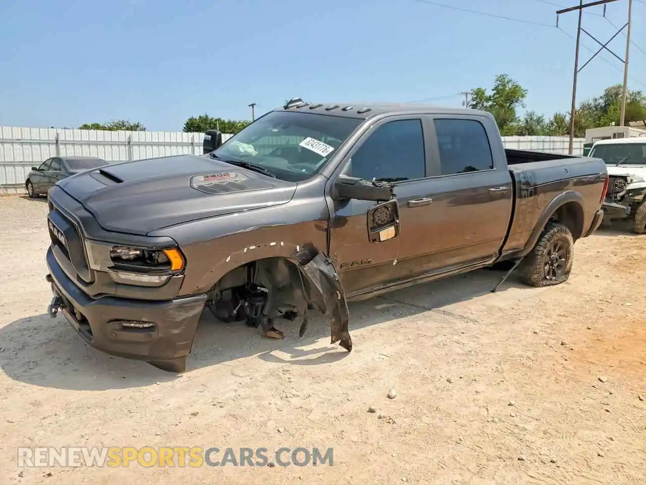 1 Photograph of a damaged car 3C6TR5EJ2RG173679 RAM 2500 2024