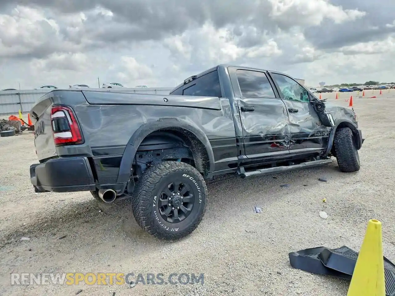 3 Photograph of a damaged car 3C6TR5EJ6RG369348 RAM 2500 2024
