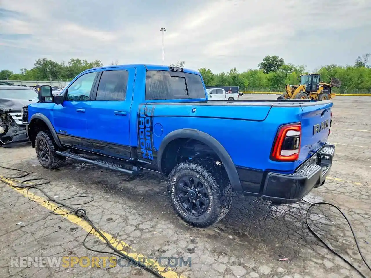 2 Photograph of a damaged car 3C6TR5EJ9RG131896 RAM 2500 2024