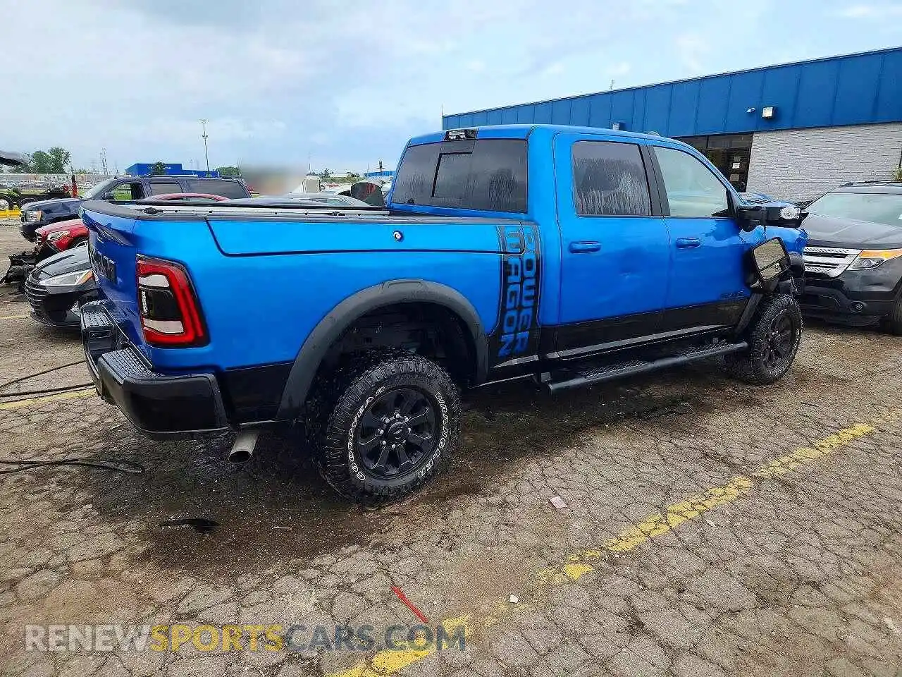 3 Photograph of a damaged car 3C6TR5EJ9RG131896 RAM 2500 2024