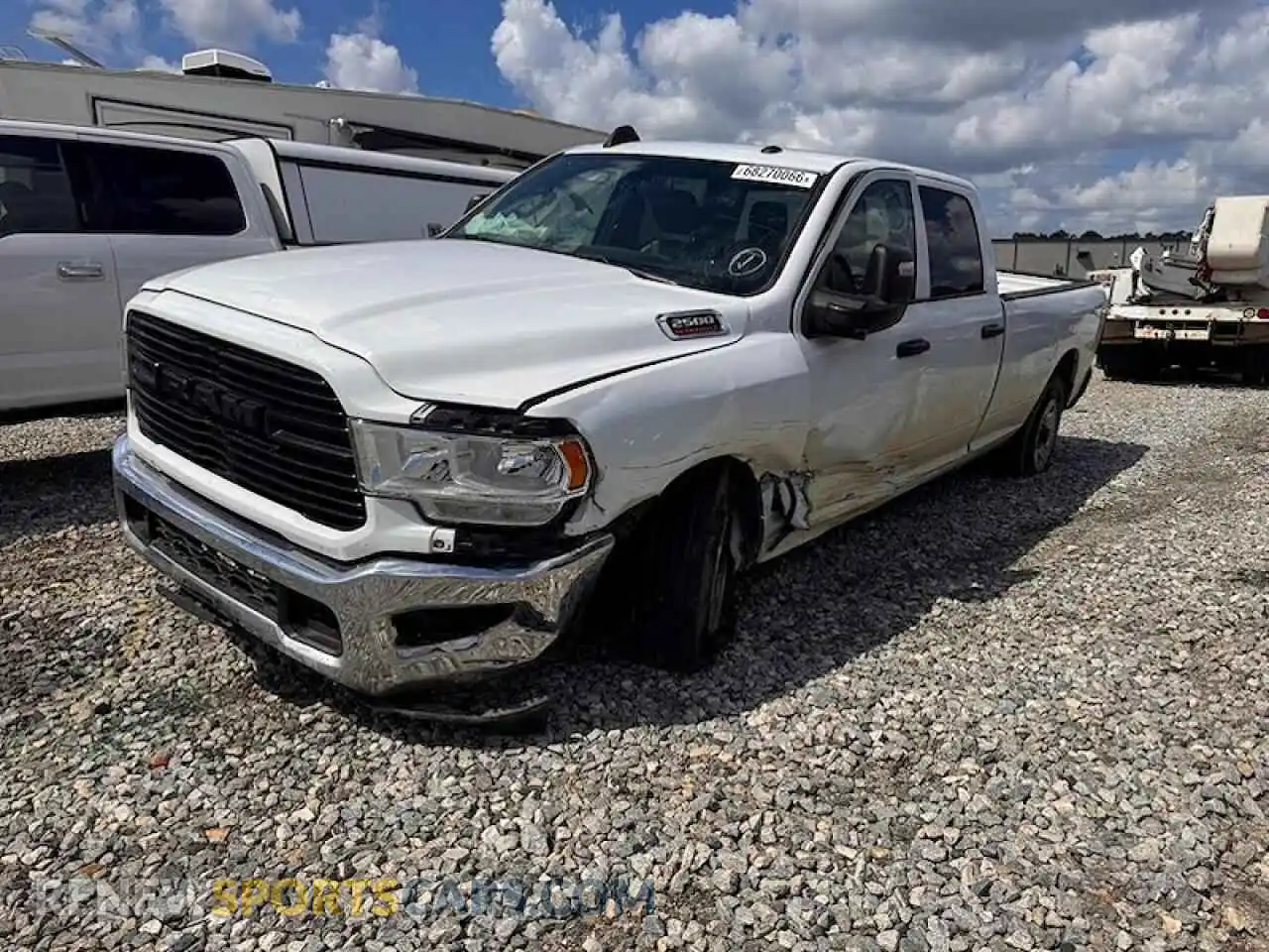 1 Photograph of a damaged car 3C6UR4HJ0RG175733 RAM 2500 2024