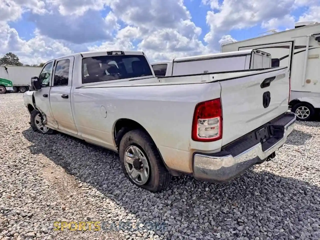 2 Photograph of a damaged car 3C6UR4HJ0RG175733 RAM 2500 2024