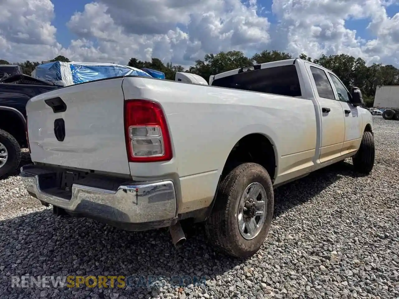3 Photograph of a damaged car 3C6UR4HJ0RG175733 RAM 2500 2024