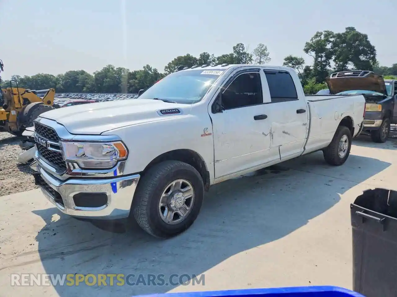 1 Photograph of a damaged car 3C6UR4HL7RG416348 RAM 2500 2024