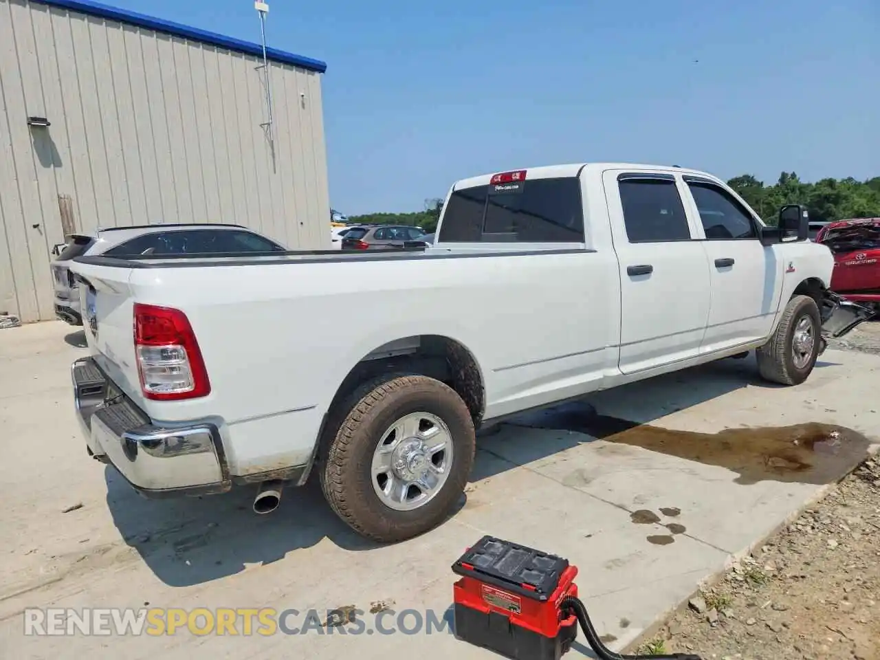 3 Photograph of a damaged car 3C6UR4HL7RG416348 RAM 2500 2024