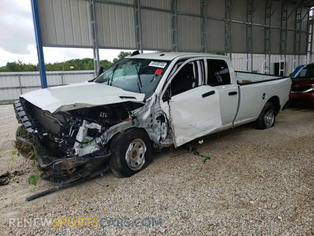 1 Photograph of a damaged car 3C6UR4HL9RG328420 RAM 2500 2024