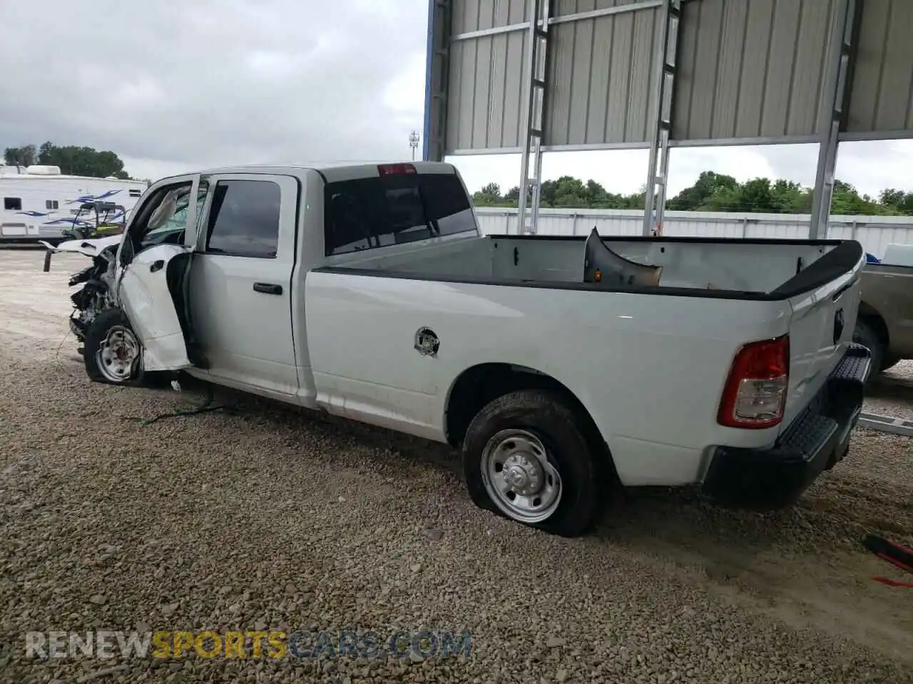2 Photograph of a damaged car 3C6UR4HL9RG328420 RAM 2500 2024