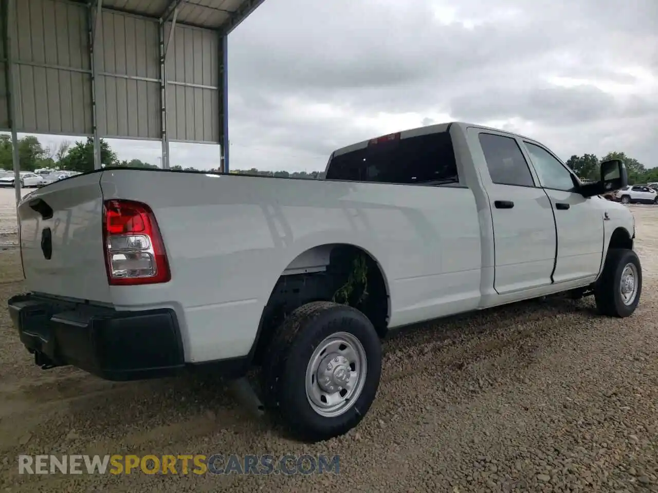 3 Photograph of a damaged car 3C6UR4HL9RG328420 RAM 2500 2024
