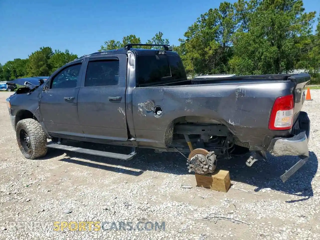 2 Photograph of a damaged car 3C6UR5CJ3RG181278 RAM 2500 2024