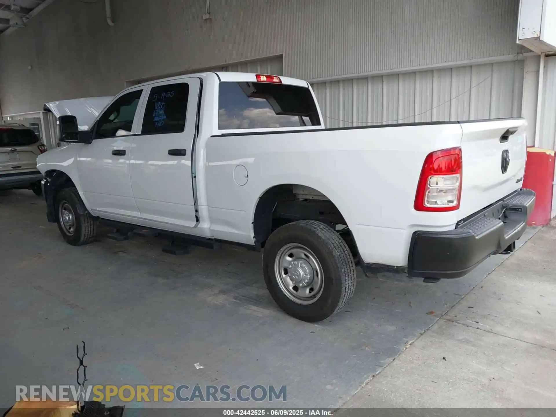 3 Photograph of a damaged car 3C6UR5CJ4RG267621 RAM 2500 2024