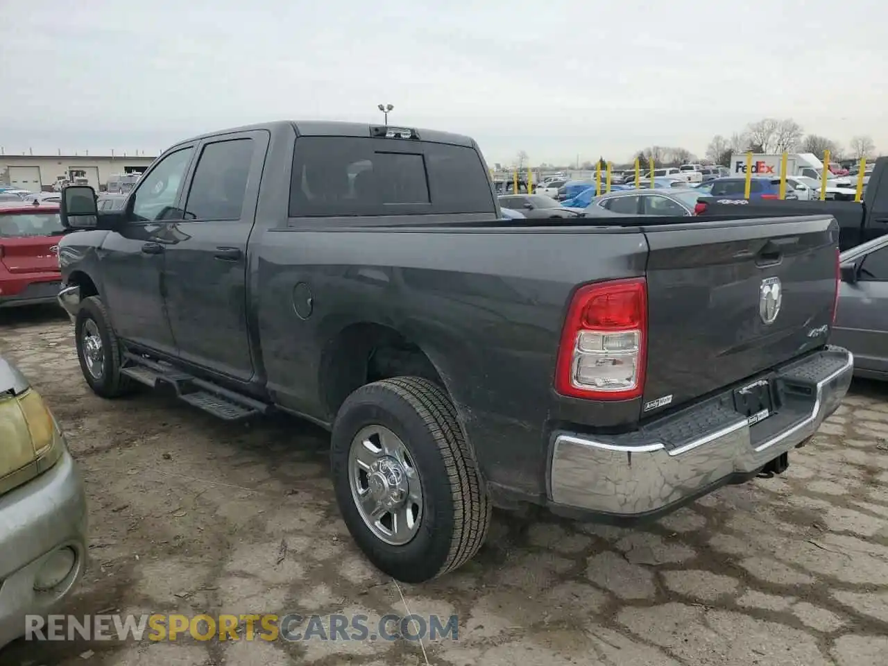 2 Photograph of a damaged car 3C6UR5CJ4RG367640 RAM 2500 2024