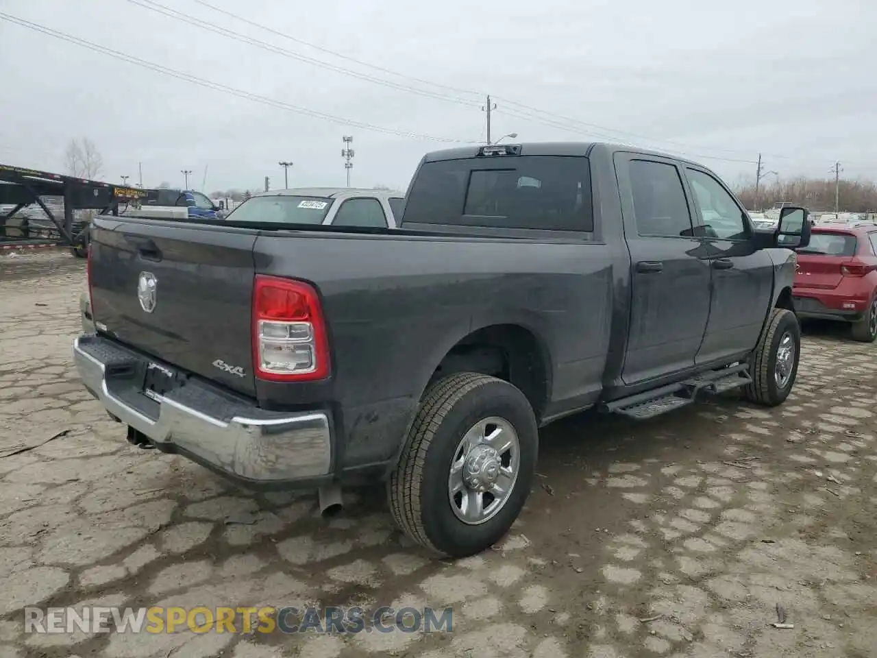 3 Photograph of a damaged car 3C6UR5CJ4RG367640 RAM 2500 2024