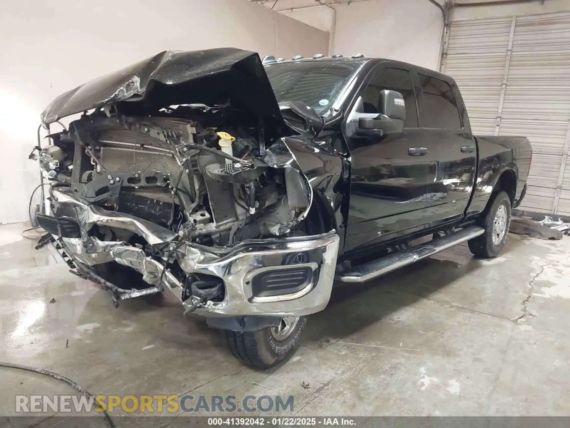 2 Photograph of a damaged car 3C6UR5CJ5RG251069 RAM 2500 2024
