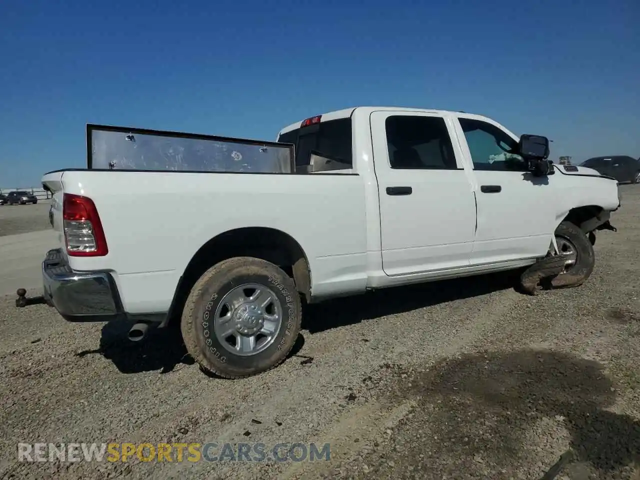 3 Photograph of a damaged car 3C6UR5CJ8RG124381 RAM 2500 2024
