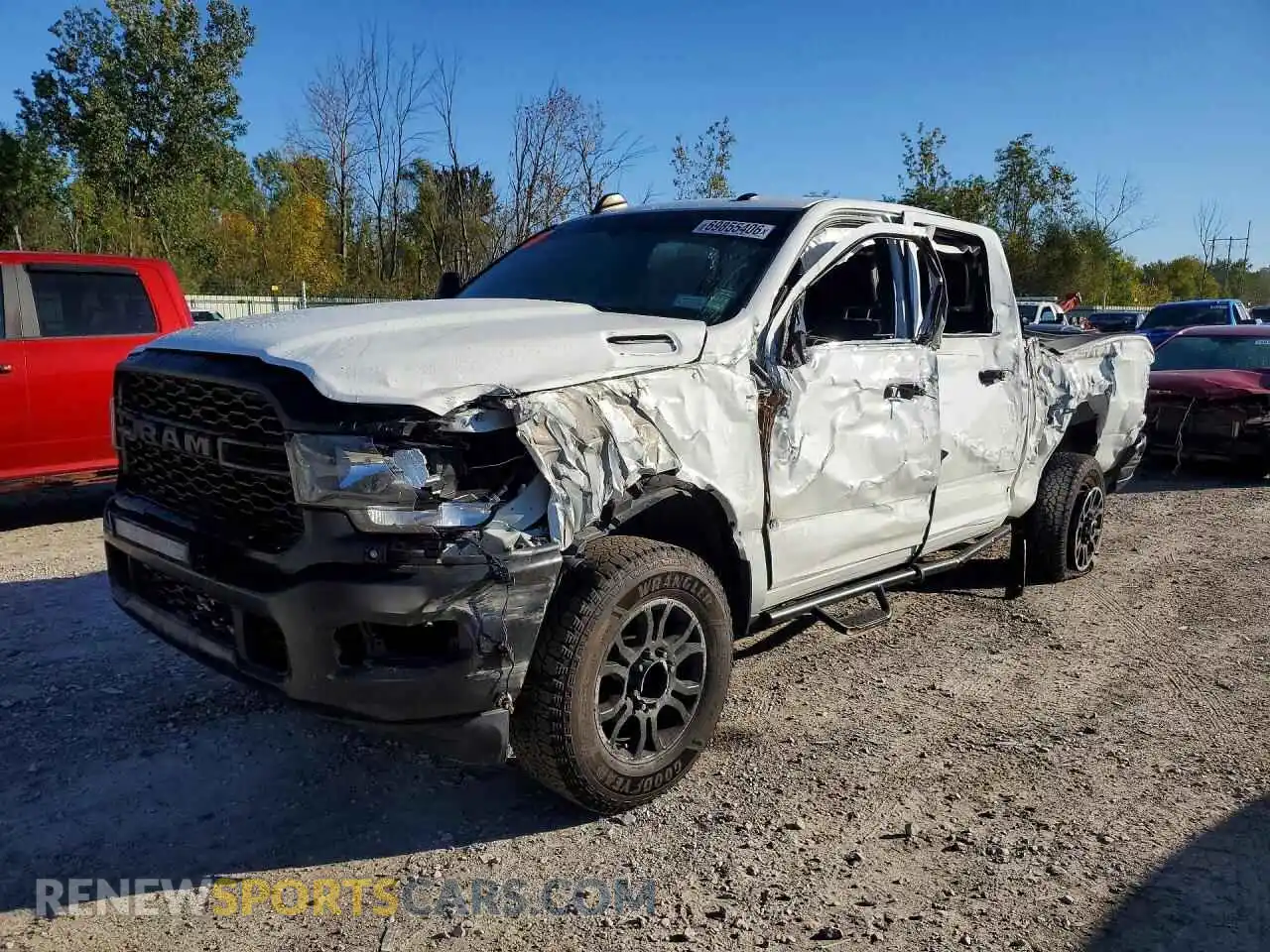 1 Photograph of a damaged car 3C6UR5CJ9RG162315 RAM 2500 2024