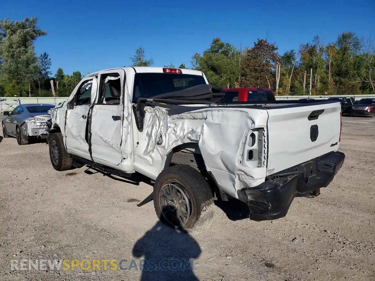 2 Photograph of a damaged car 3C6UR5CJ9RG162315 RAM 2500 2024
