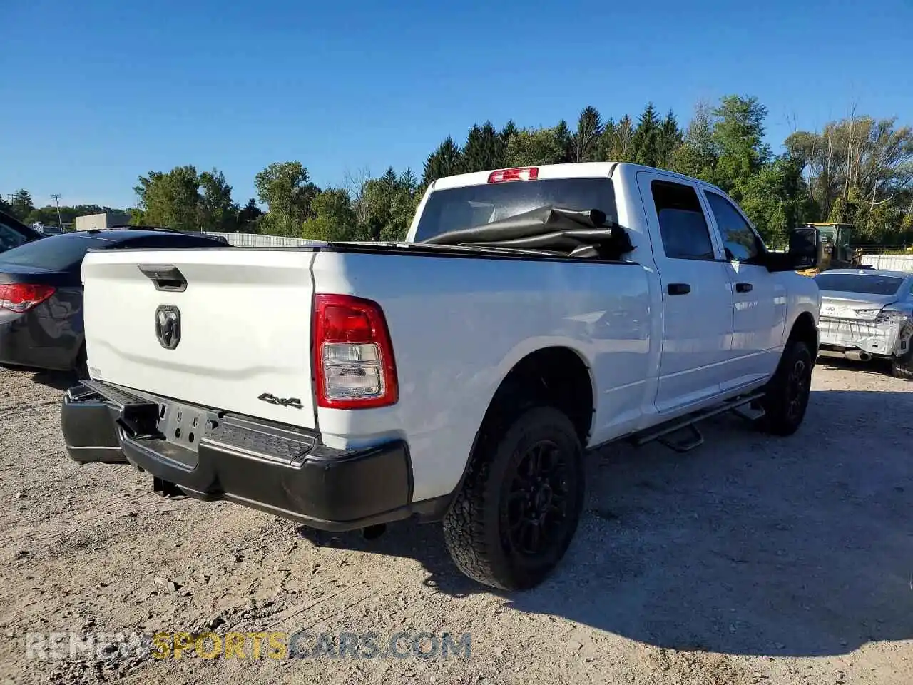 3 Photograph of a damaged car 3C6UR5CJ9RG162315 RAM 2500 2024