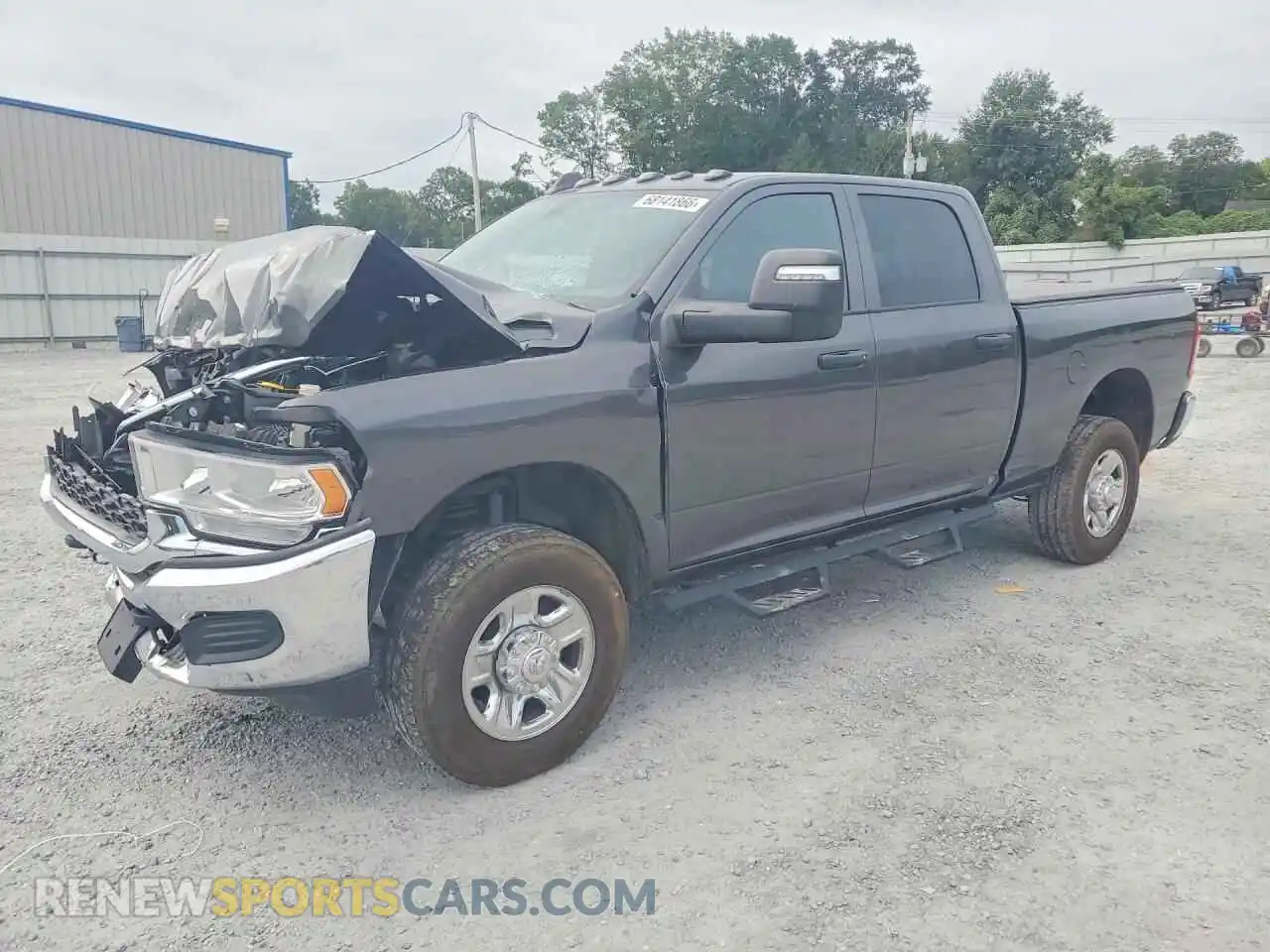 1 Photograph of a damaged car 3C6UR5CJ9RG314822 RAM 2500 2024