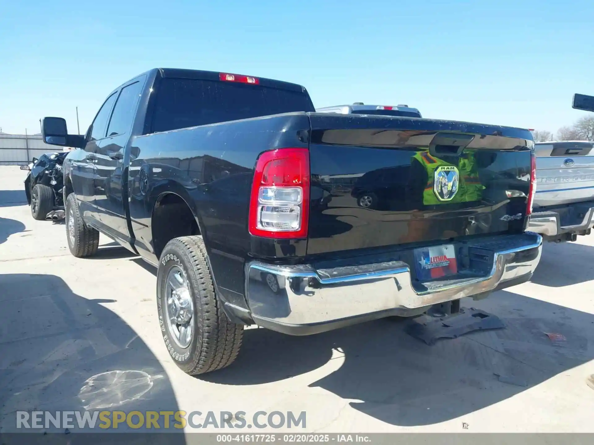 3 Photograph of a damaged car 3C6UR5CL0RG264829 RAM 2500 2024