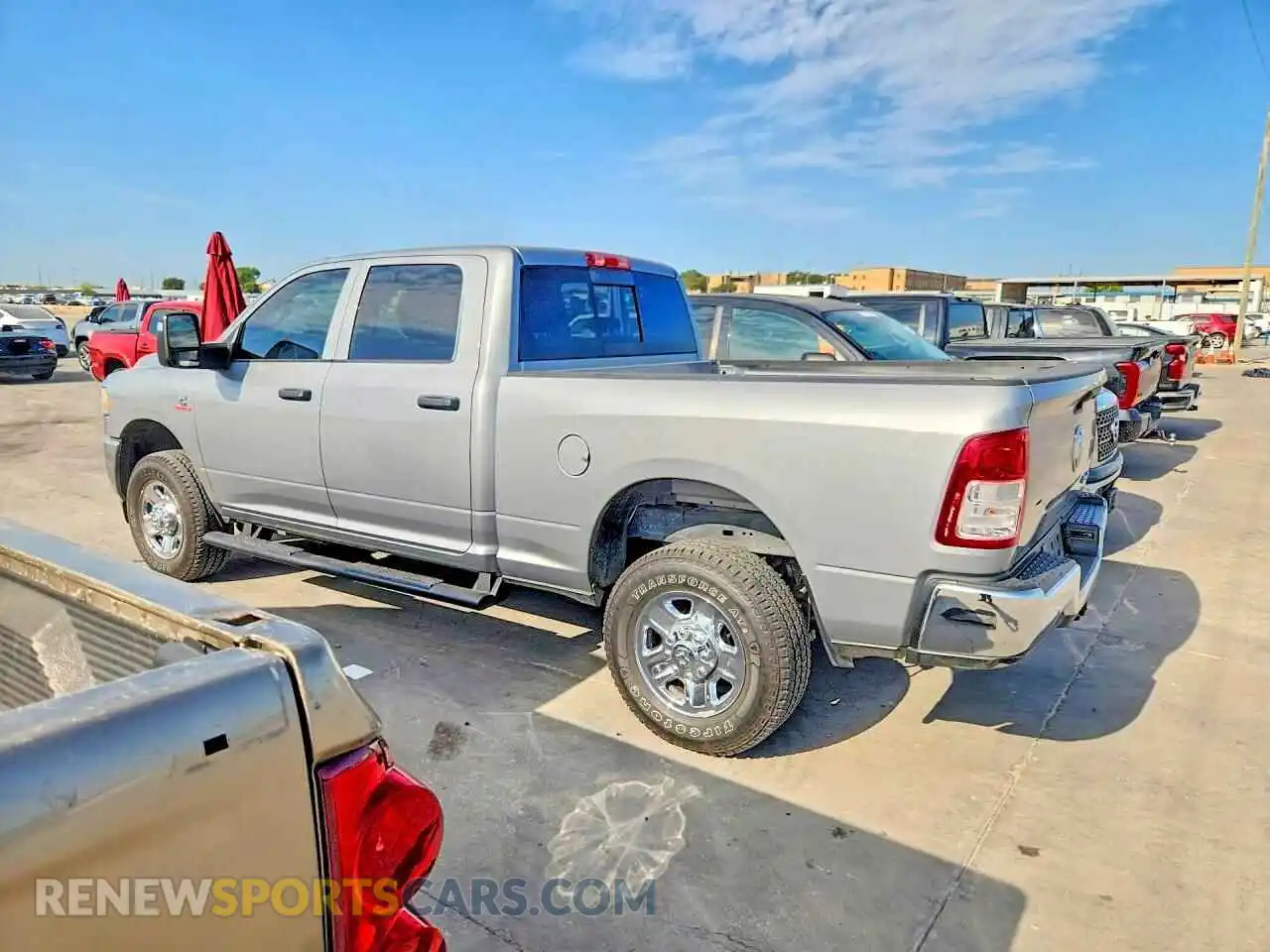 2 Photograph of a damaged car 3C6UR5CL1RG319630 RAM 2500 2024