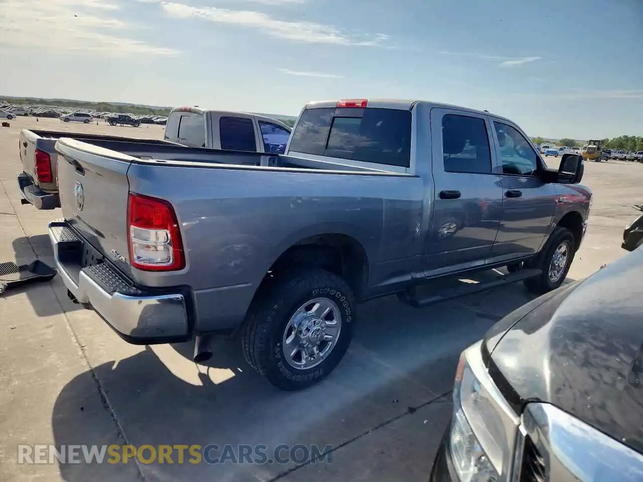 3 Photograph of a damaged car 3C6UR5CL1RG319630 RAM 2500 2024