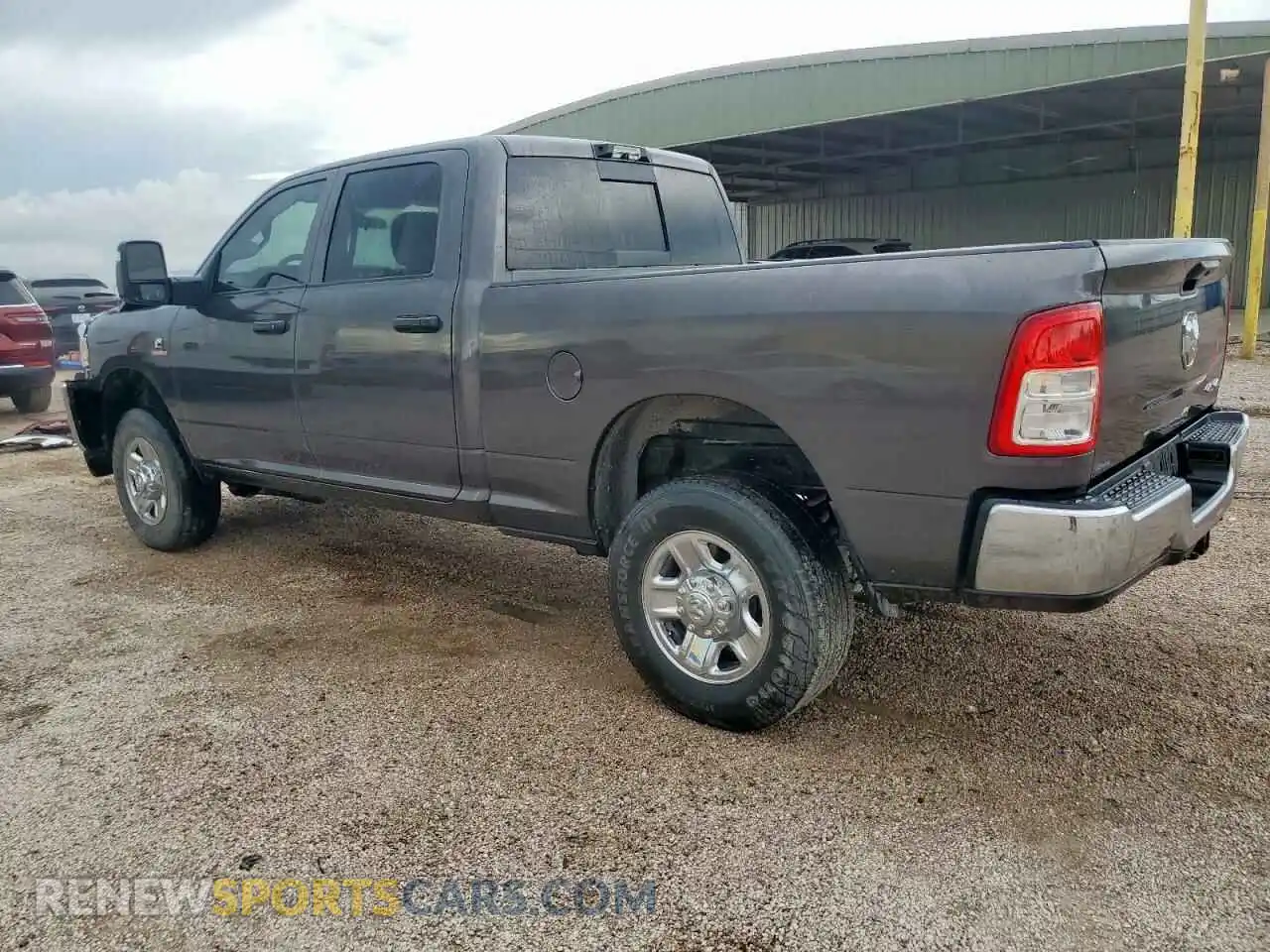 2 Photograph of a damaged car 3C6UR5CL2RG119422 RAM 2500 2024