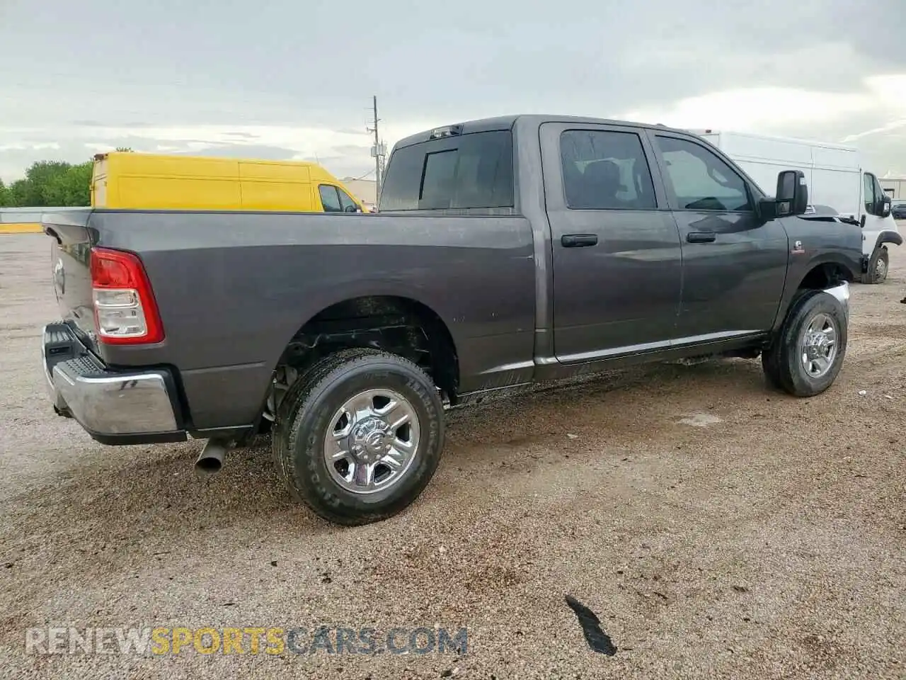 3 Photograph of a damaged car 3C6UR5CL2RG119422 RAM 2500 2024