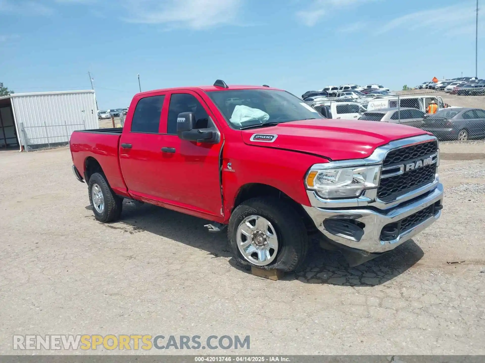 1 Photograph of a damaged car 3C6UR5CL2RG235185 RAM 2500 2024