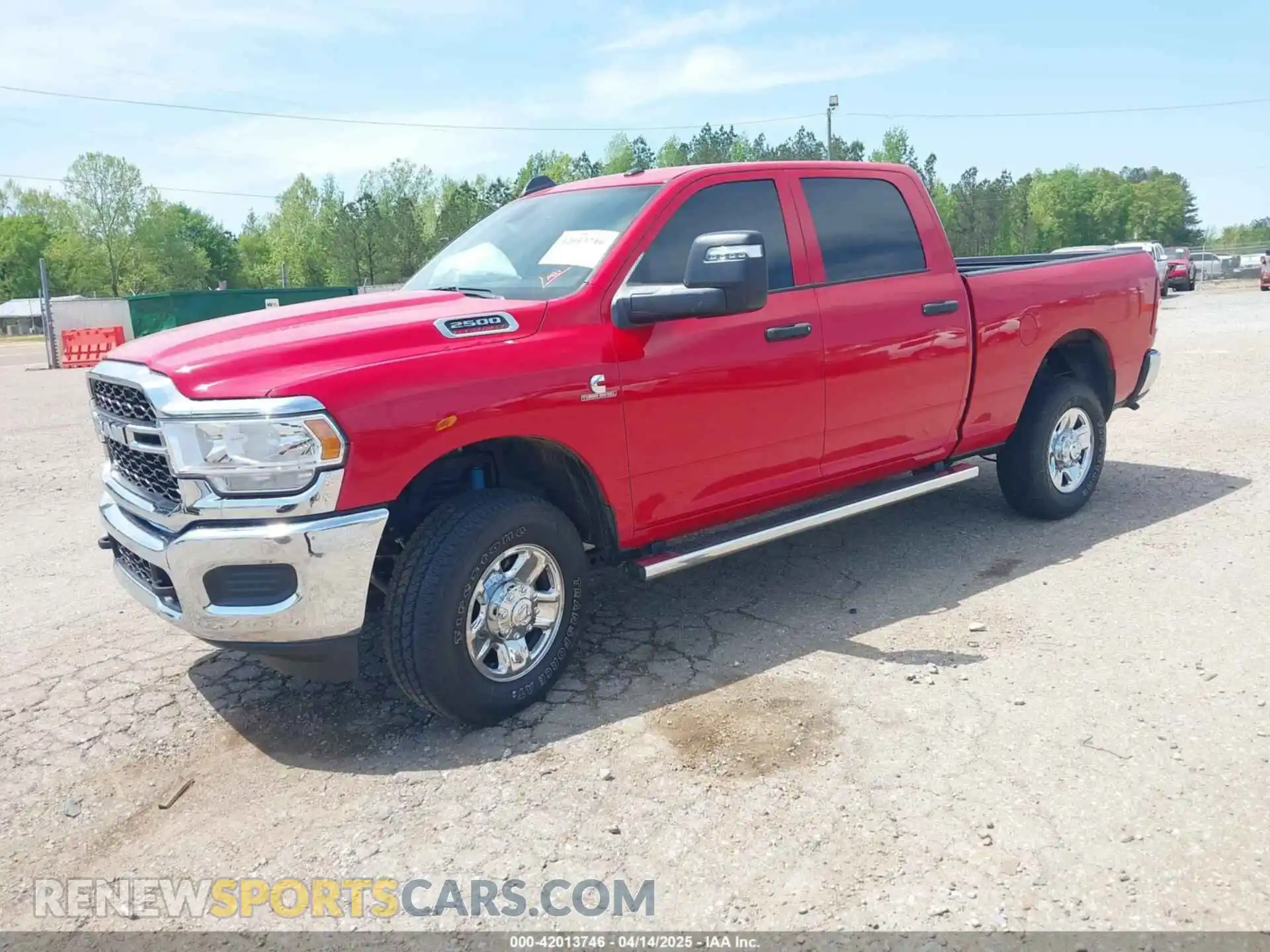 2 Photograph of a damaged car 3C6UR5CL2RG235185 RAM 2500 2024