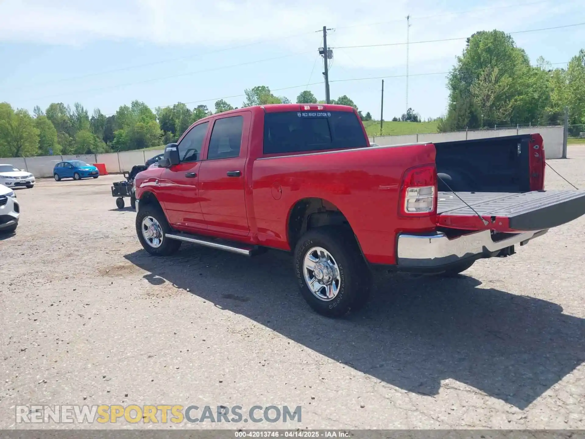 3 Photograph of a damaged car 3C6UR5CL2RG235185 RAM 2500 2024