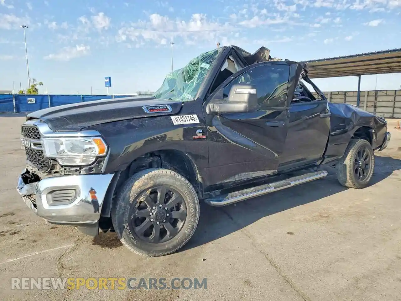 1 Photograph of a damaged car 3C6UR5CL2RG393364 RAM 2500 2024