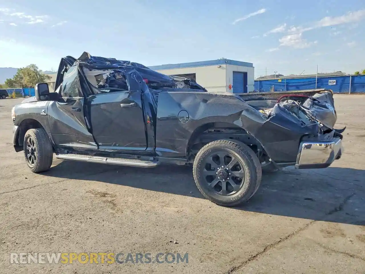 2 Photograph of a damaged car 3C6UR5CL2RG393364 RAM 2500 2024