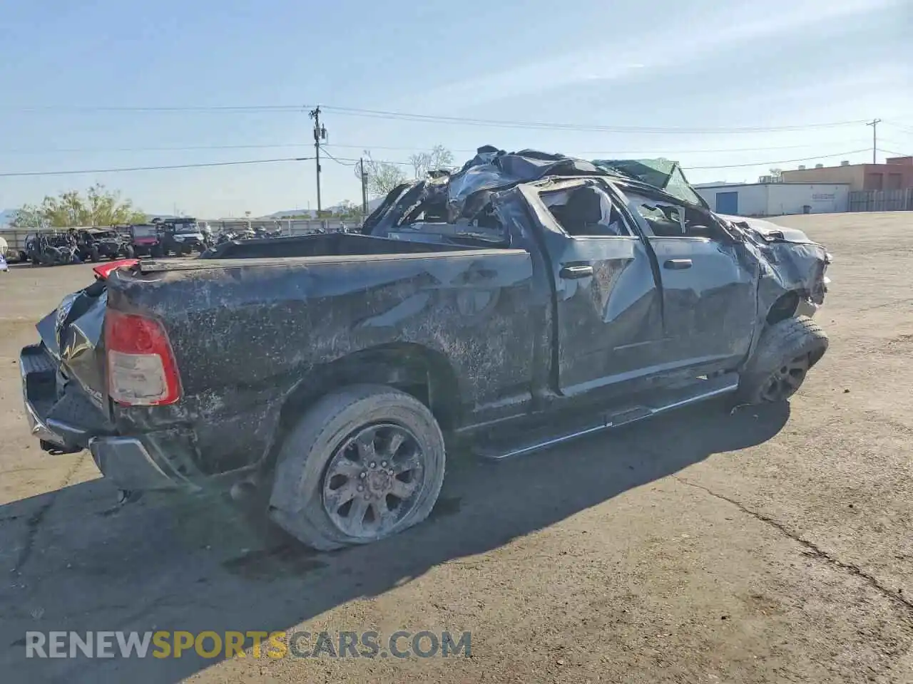 3 Photograph of a damaged car 3C6UR5CL2RG393364 RAM 2500 2024
