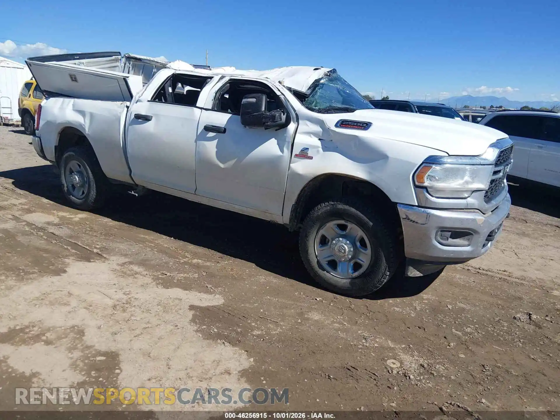 1 Photograph of a damaged car 3C6UR5CL4RG194655 RAM 2500 2024