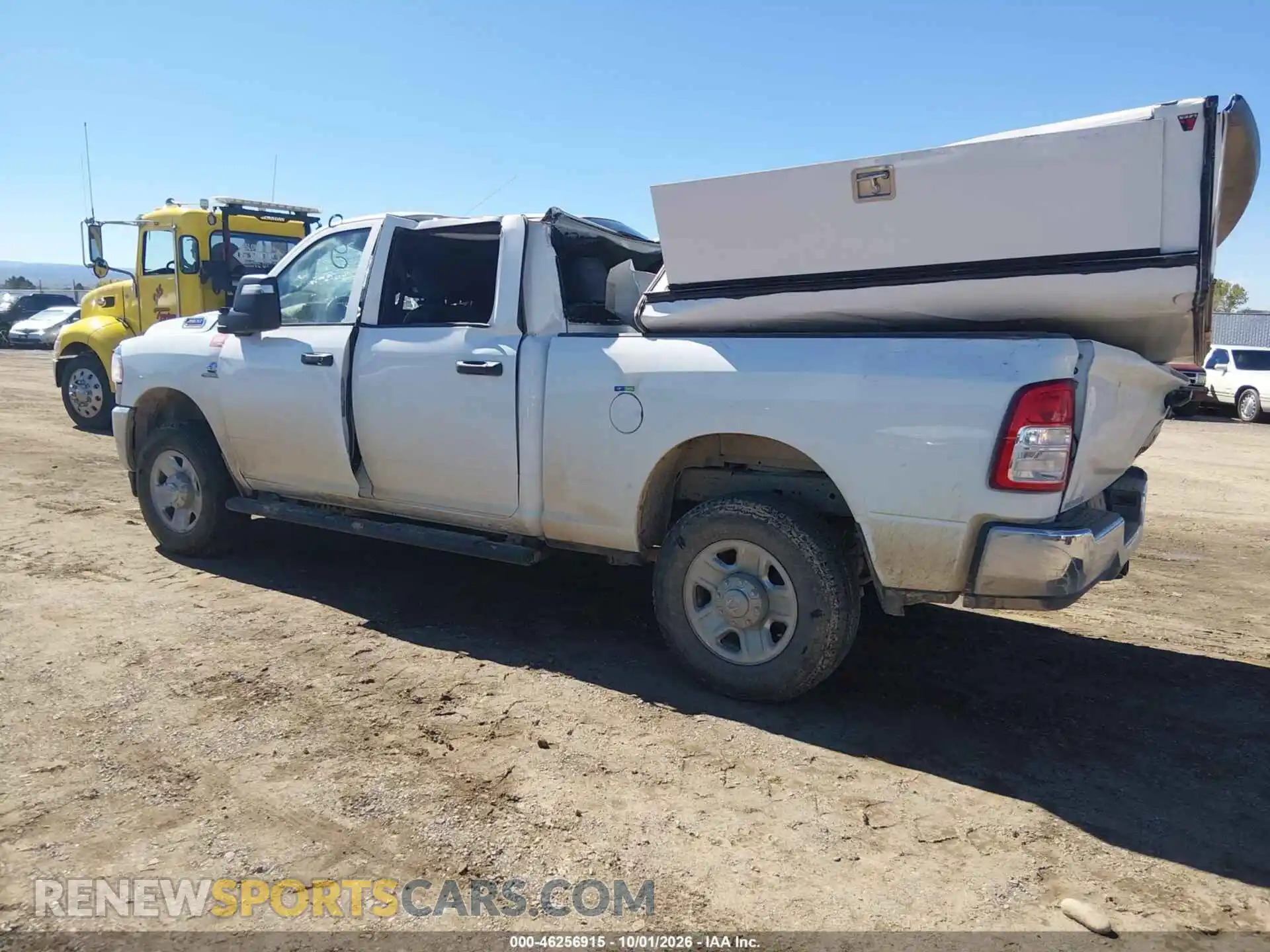 3 Photograph of a damaged car 3C6UR5CL4RG194655 RAM 2500 2024