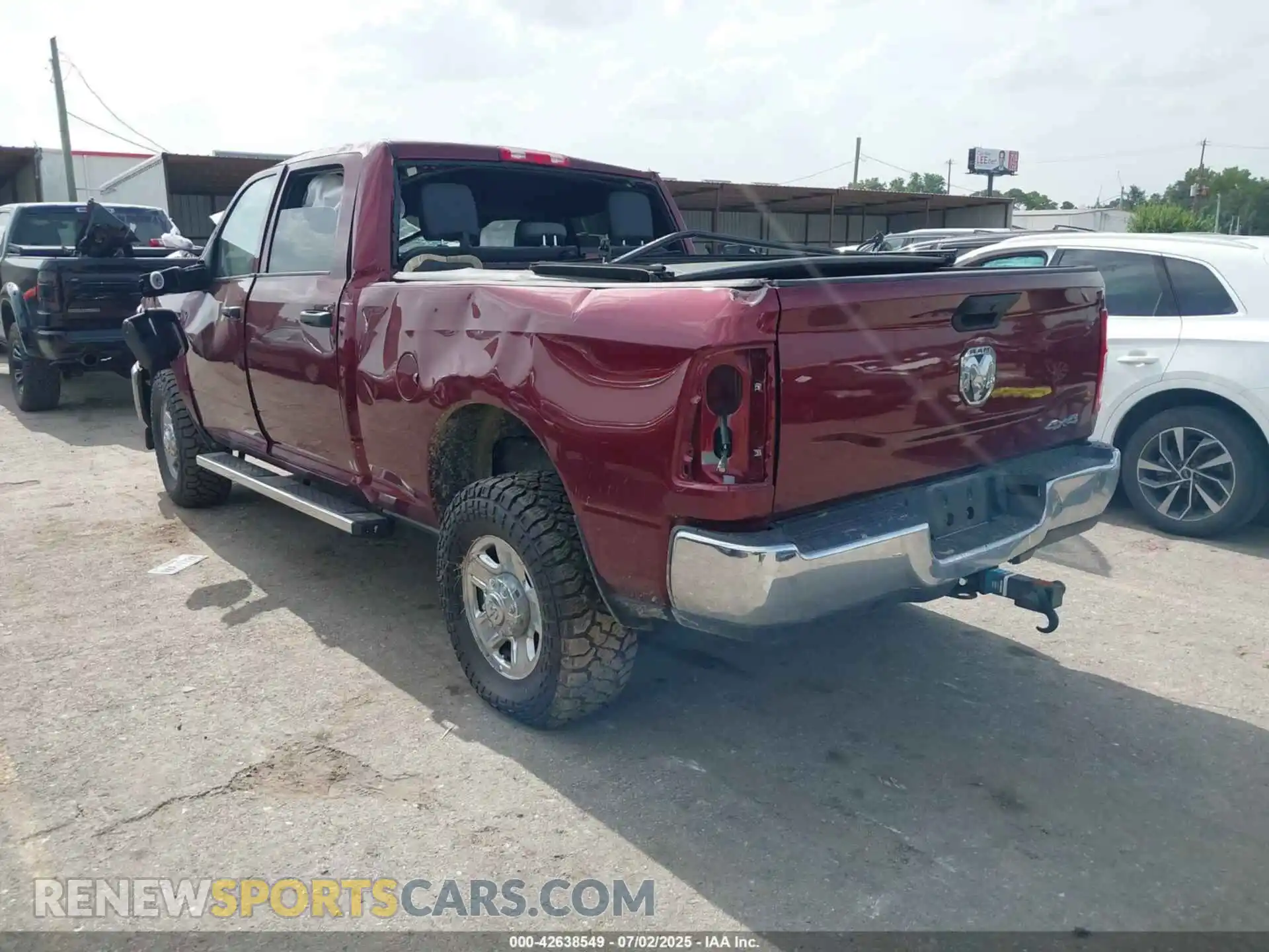 3 Photograph of a damaged car 3C6UR5CL5RG264826 RAM 2500 2024