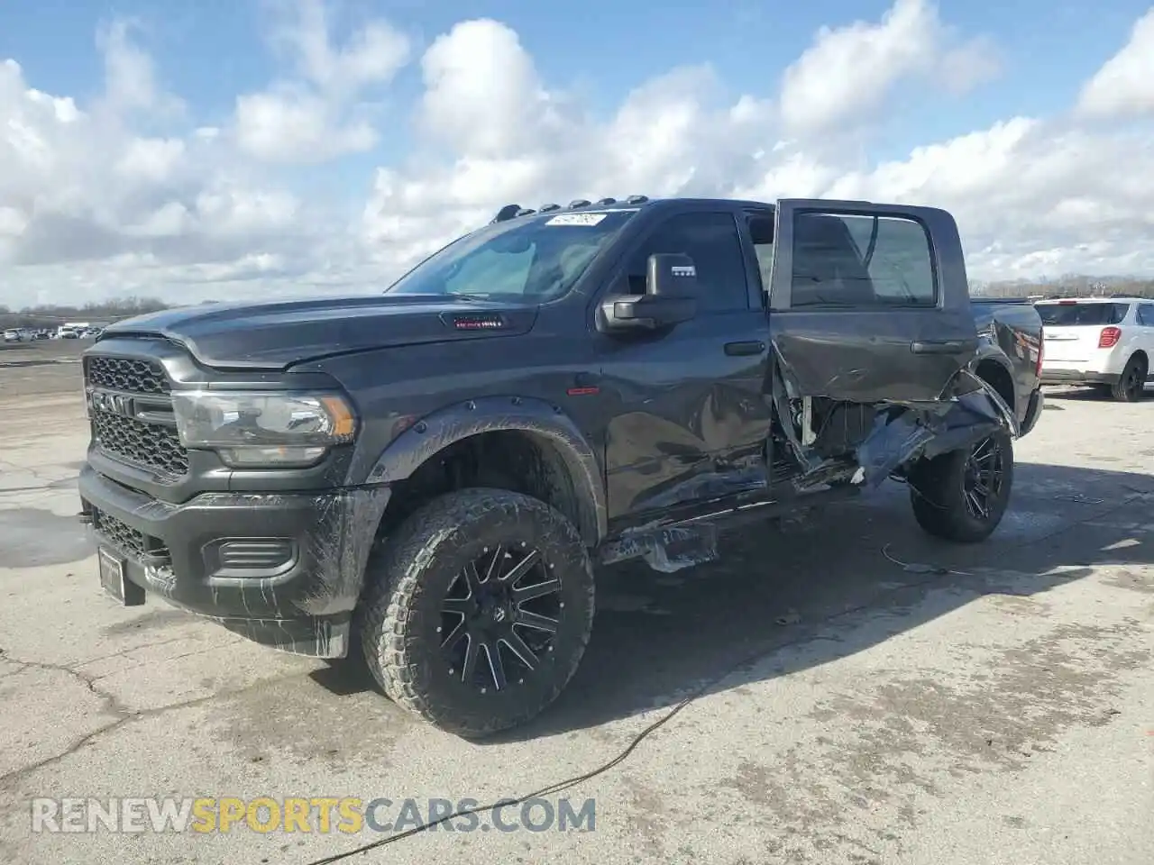 1 Photograph of a damaged car 3C6UR5CL5RG332347 RAM 2500 2024