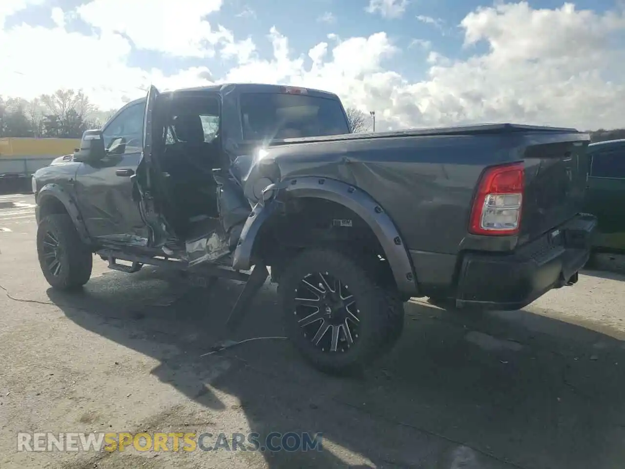 2 Photograph of a damaged car 3C6UR5CL5RG332347 RAM 2500 2024