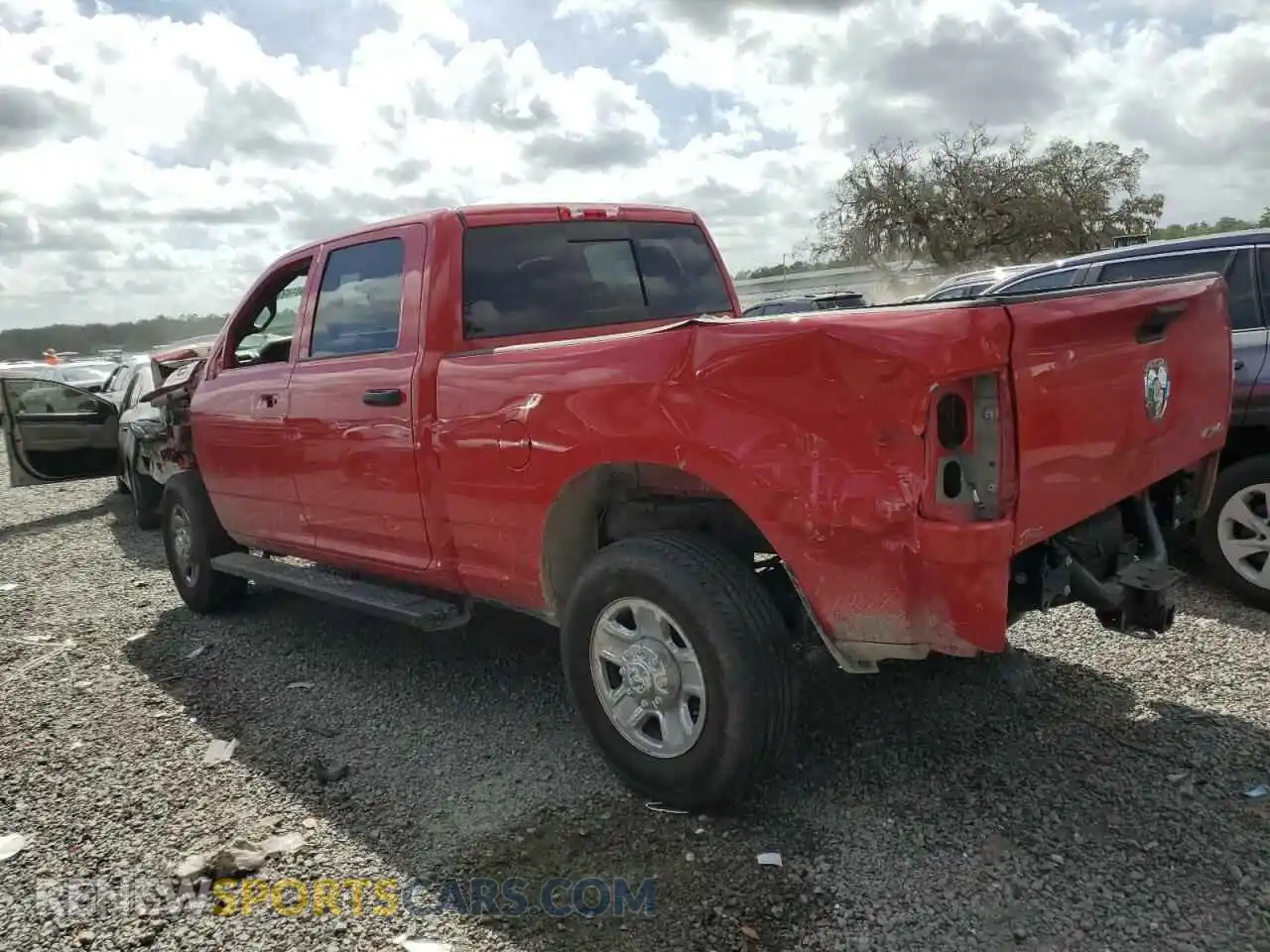 2 Photograph of a damaged car 3C6UR5CL6RG245542 RAM 2500 2024