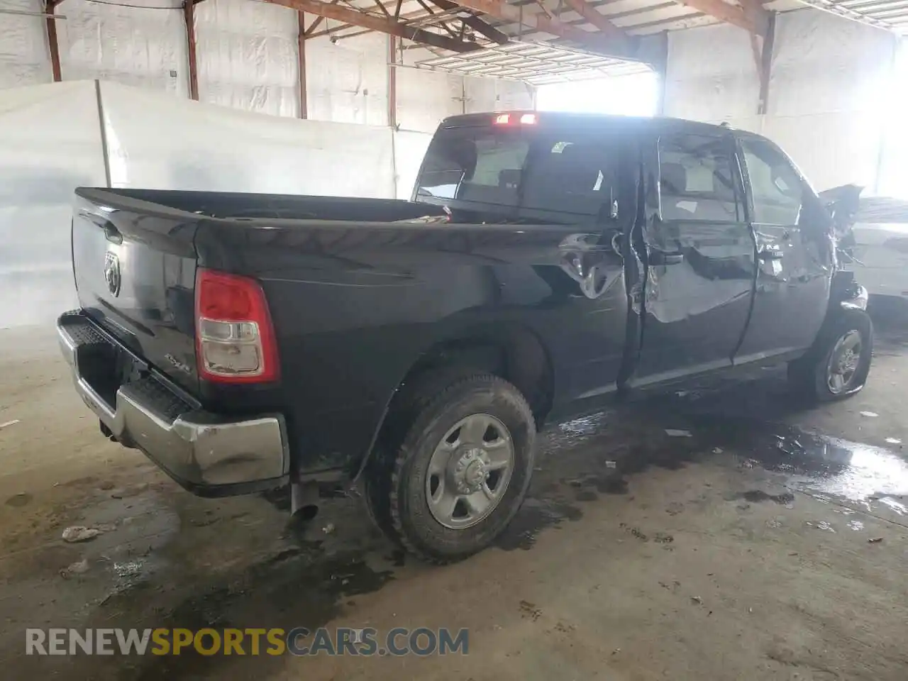 3 Photograph of a damaged car 3C6UR5CL6RG309563 RAM 2500 2024