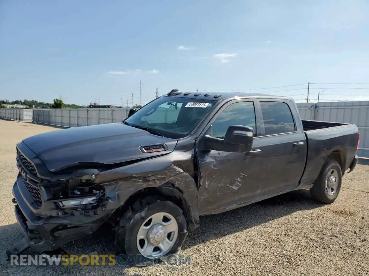 1 Photograph of a damaged car 3C6UR5CL6RG328517 RAM 2500 2024