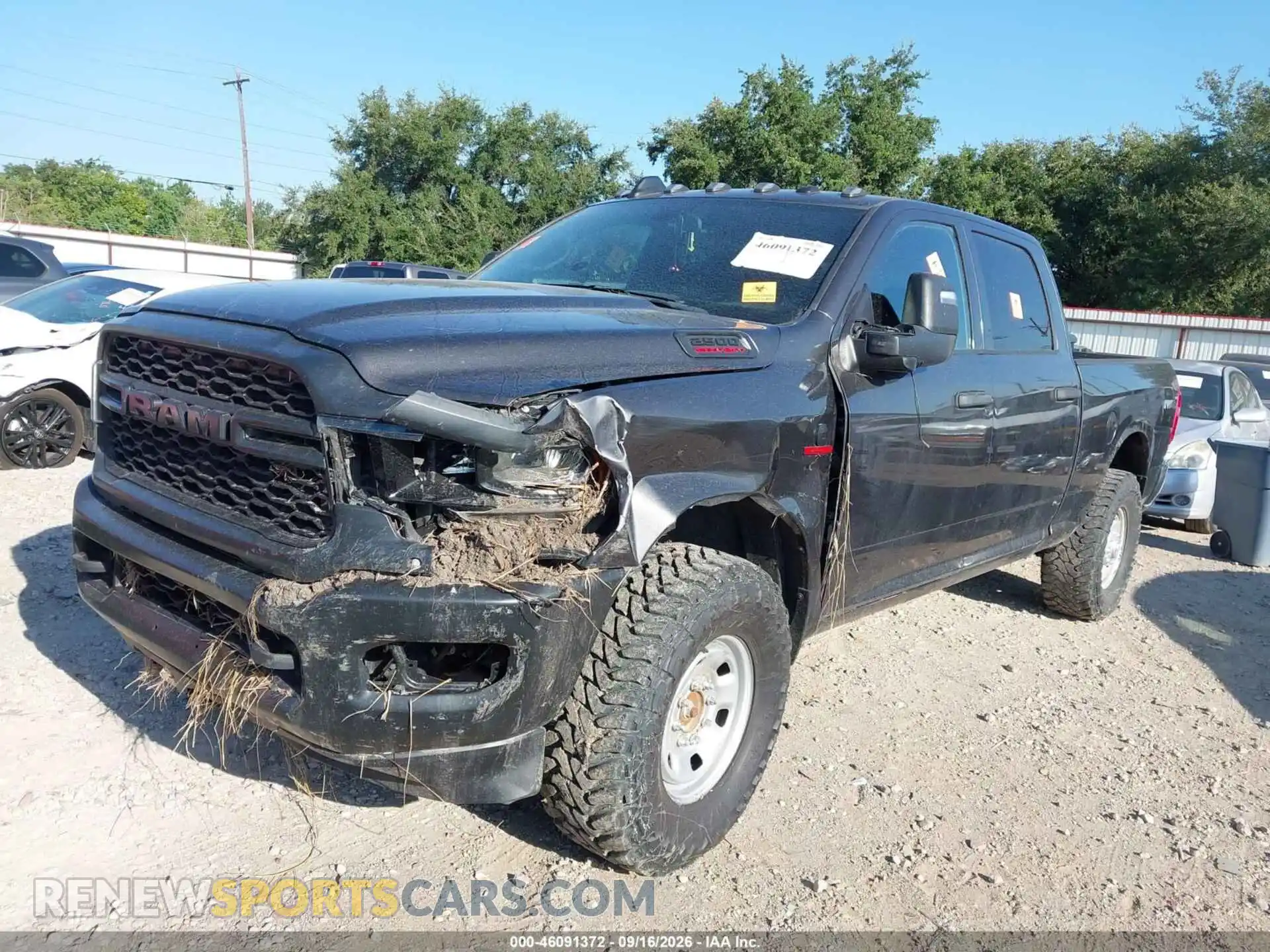2 Photograph of a damaged car 3C6UR5CL7RG277917 RAM 2500 2024