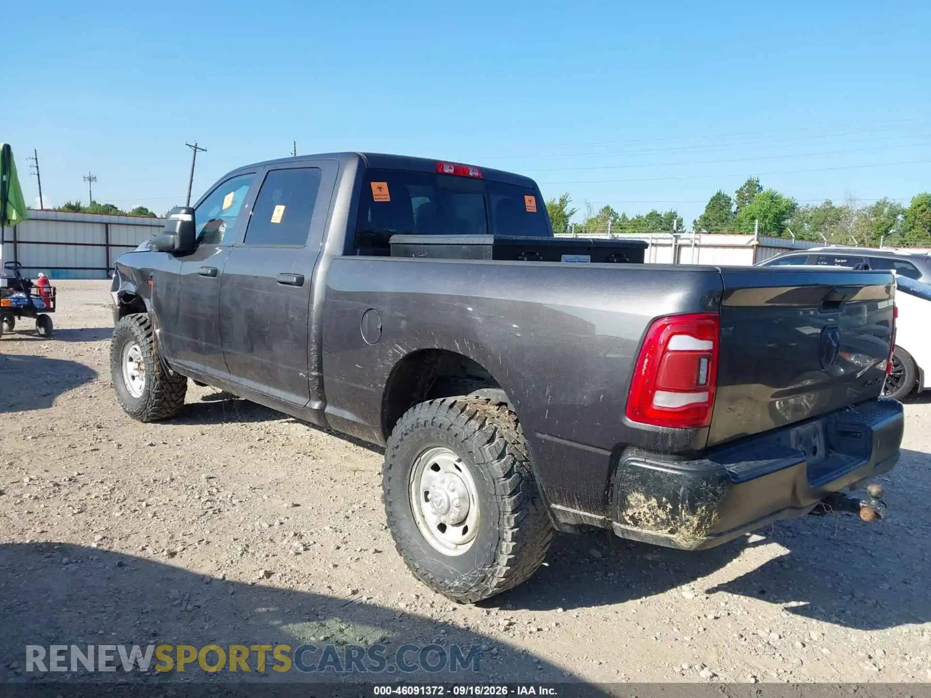 3 Photograph of a damaged car 3C6UR5CL7RG277917 RAM 2500 2024