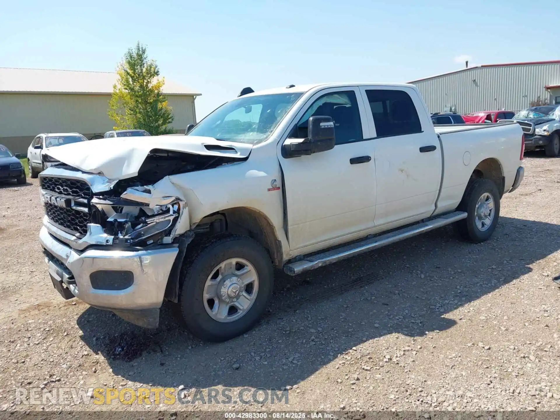 2 Photograph of a damaged car 3C6UR5CL7RG356570 RAM 2500 2024