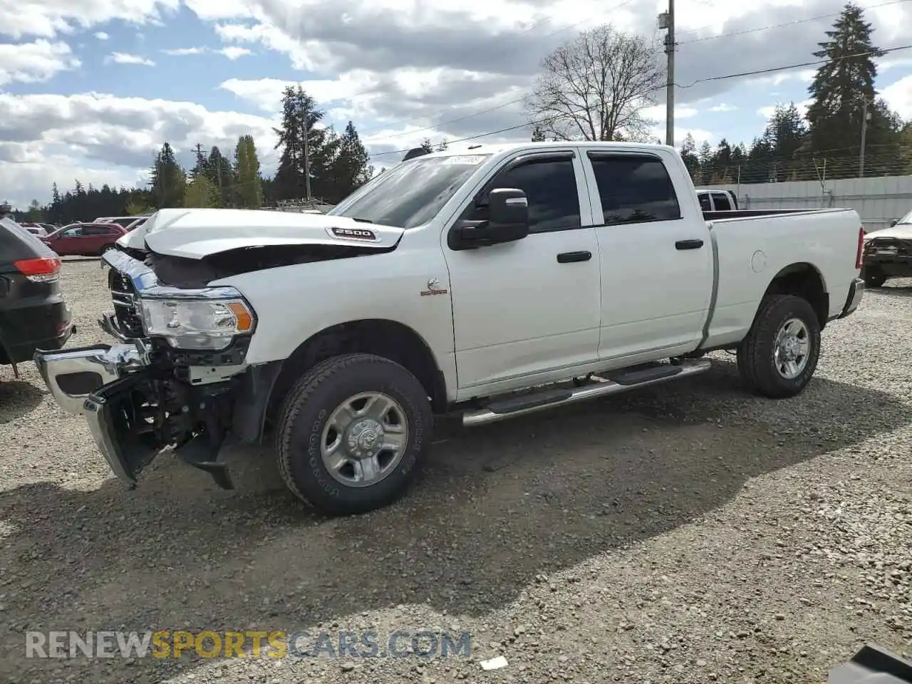 1 Photograph of a damaged car 3C6UR5CL8RG298811 RAM 2500 2024