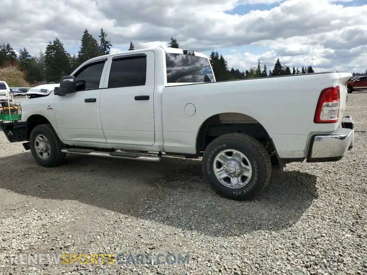 2 Photograph of a damaged car 3C6UR5CL8RG298811 RAM 2500 2024