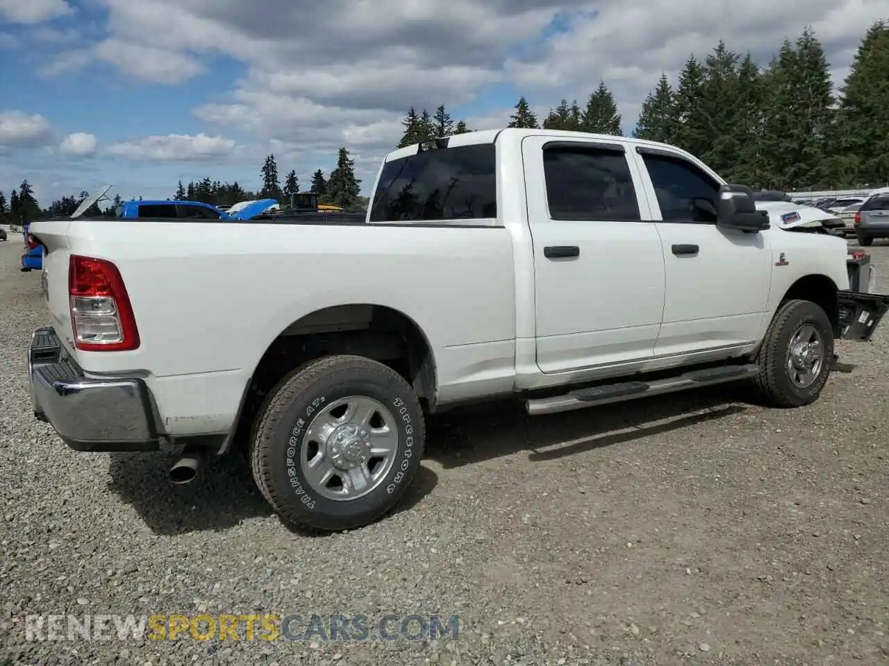 3 Photograph of a damaged car 3C6UR5CL8RG298811 RAM 2500 2024
