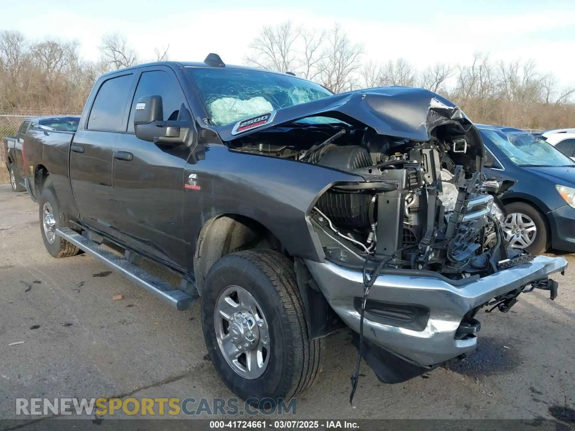 1 Photograph of a damaged car 3C6UR5CL9RG245485 RAM 2500 2024