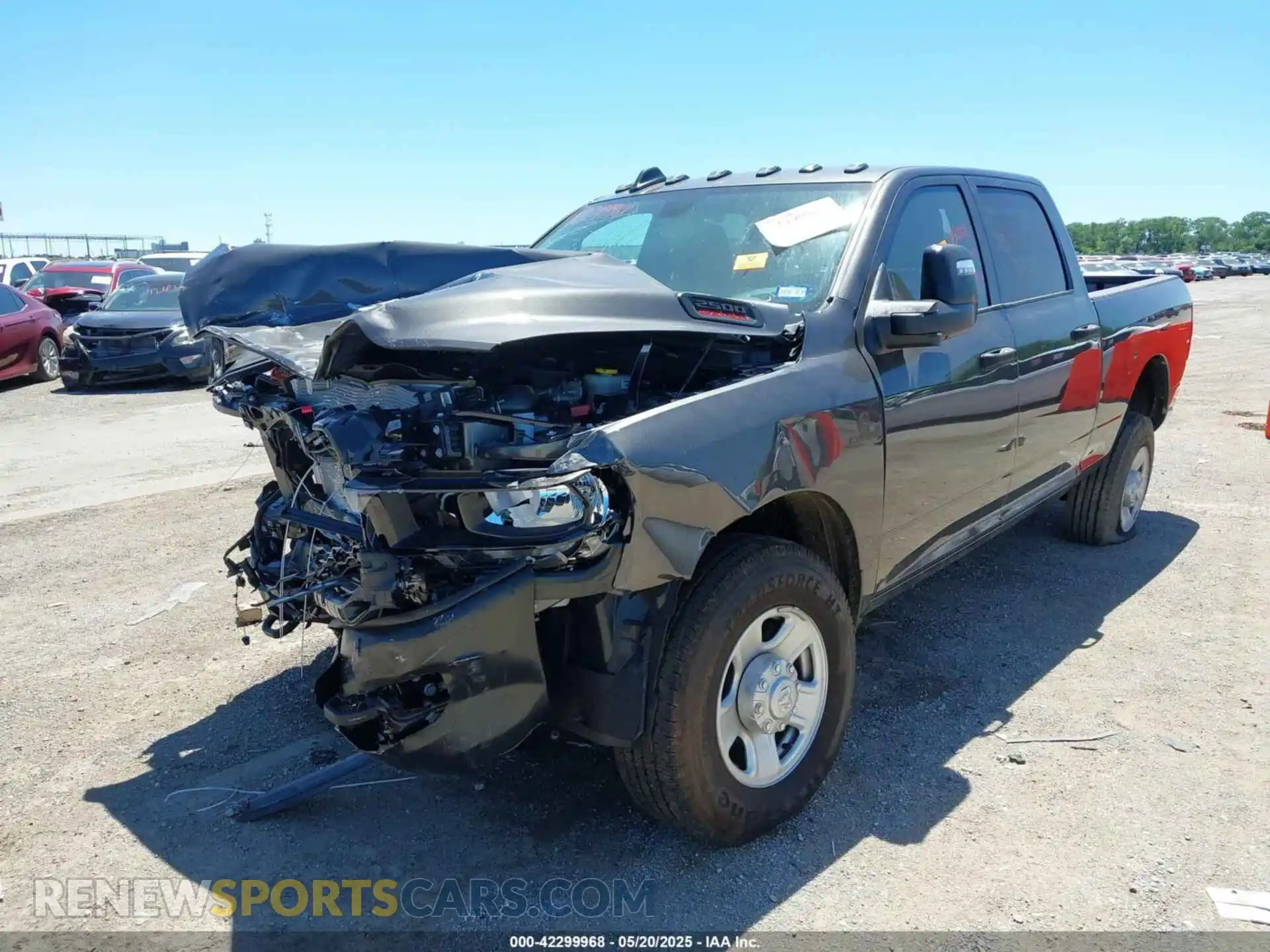 2 Photograph of a damaged car 3C6UR5CL9RG330312 RAM 2500 2024