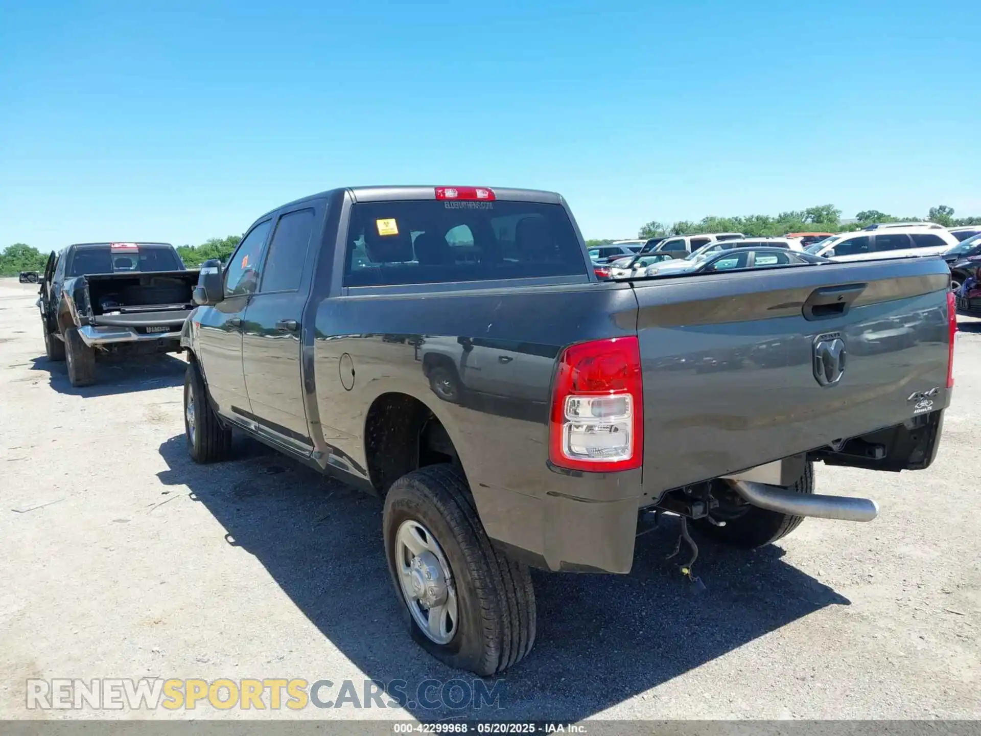 3 Photograph of a damaged car 3C6UR5CL9RG330312 RAM 2500 2024